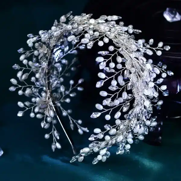 Elegant Braidani silver pearl crystal wedding hair accessories headband, featuring stunning pearls and crystals, perfect for enhancing bridal hairstyles.