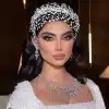 Second model view of Braidani silver pearl crystal wedding hair accessories headband, highlighting its elegant design and suitability for various bridal hairstyles.