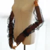 Model wearing Braidani Black lace Gloves – Elegant opera-length gloves with pearl embellishments, perfect for weddings and formal events.